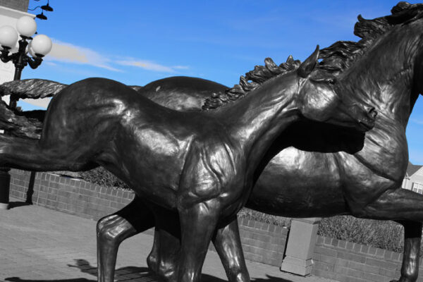 Mother Colt Horse statues parker station mainstreet parker colorado